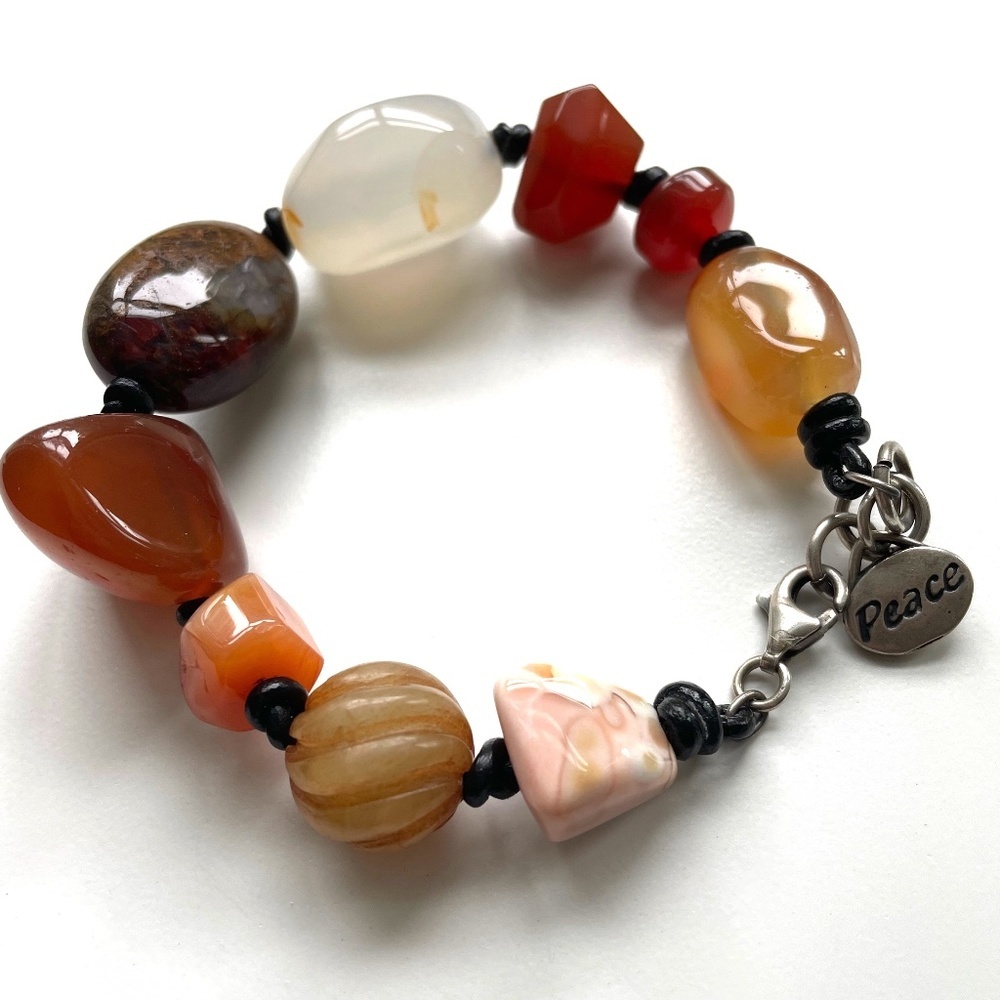 Fall colors: large semi precious stone knotted bracelet with Peace charm